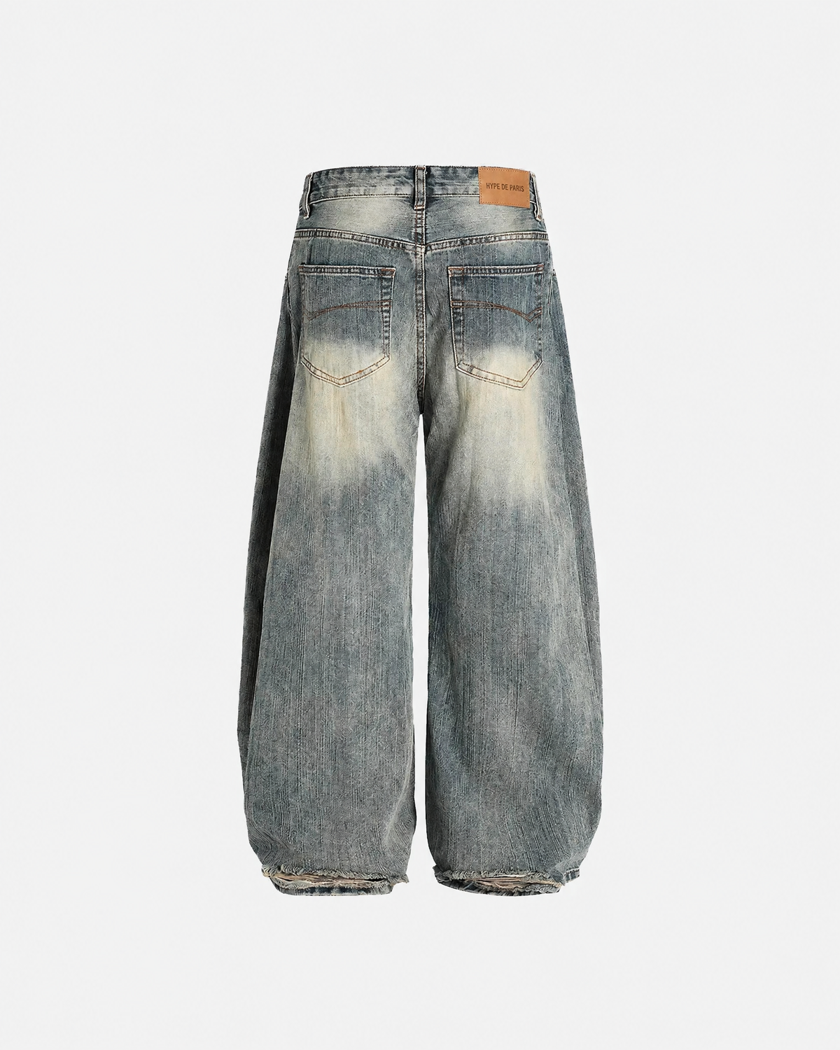 Jean baggy bleu délavé à texture irrégulière — vue complémentaire
